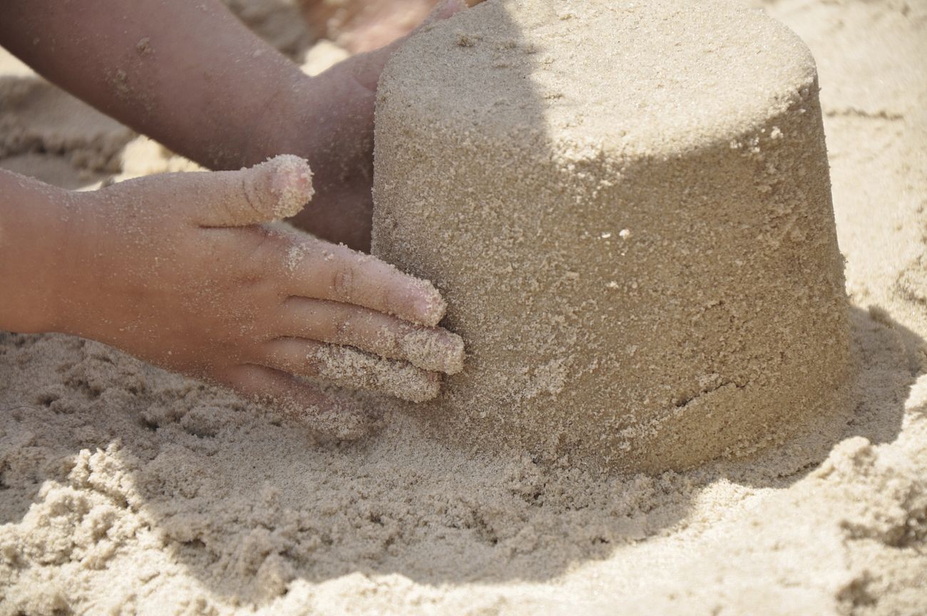 Kid playing in the sand