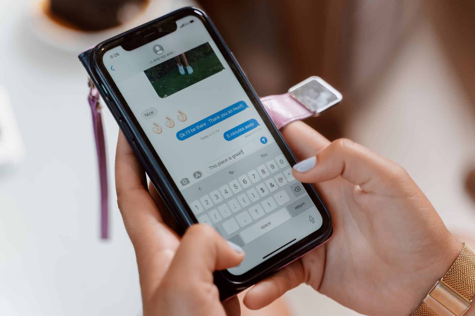 close up shot of a person sending text message